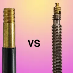 Schrader vs. Presta valve stems, a cyclist's dilemma. The gold Schrader on the left, the silver Presta on the right.