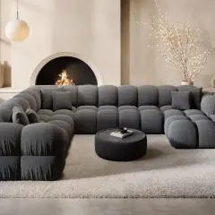 Gemütliche graue Velourcouch, die zum Entspannen einlädt. Tipps zur velourcouch reinigen für ein frisches Wohngefühl.