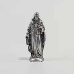 Metalowa figurka Jezusa z Sercem. Czy jednorazowe upicie się to grzech ciężki?