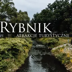 Rybnik: malowniczy strumień wśród zieleni, zapraszający do odkrywania jego atrakcji turystycznych.