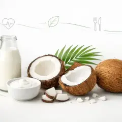 Butelka mleka kokosowego, miseczka jogurtu, połówki i kawałki kokosa. Czy mleko kokosowe jest zdrowe? Tak, to zdrowy wybór!