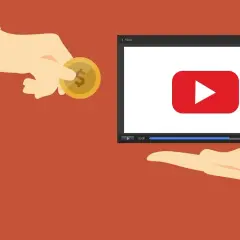 Dostajesz rekompensatę za opóźnienie dostawy w postaci monety, która spada na otwartą dłoń przed ekranem z logo YouTube.