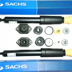 Dwa amortyzatory Sachs i akcesoria, idealne do BMW E90 tył.