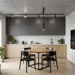 Nowoczesna kuchnia z wyspą, okrągłym stołem i krzesłami. Nad nimi wisi elegancka lampa led slim, oświetlając wnętrze.