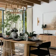 A modern dining room with a large picture of a tree. This image offers inspiration on how to hang a picture to enhance your home decor.