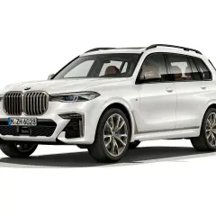 Białe BMW X8 z brązową tapicerką, eleganckie i luksusowe. Sprawdź aktualną bmw x8 cena.