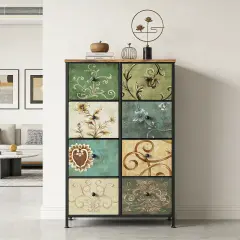 Comoda de 8 cajones con diseños florales y arabescos en tonos verdes, ocres y azules. Un mueble que aporta arte y organización.