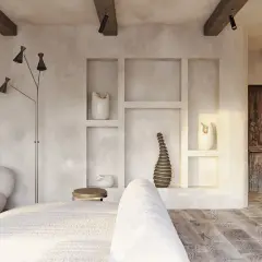 Przytulne wnętrze w stylu wabi sabi z drewnianymi belkami, tynkowanymi ścianami i rustykalnymi detalami.