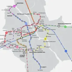 Mapa pokazuje stacje metra M2 i inne linie kolejowe w Warszawie, z zaznaczonymi węzłami przesiadkowymi i nazwami przystanków.