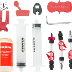 SRAM brake bleed kit with syringes, fluid, bleed block, and adapters.