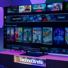 Telewizor z systemem VIDAA, na którym widać aplikacje streamingowe i filmy. To pokazuje, hisense co to za firma oferuje nowoczesne rozwiązania.