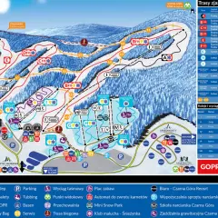 Mapa **ośrodka narciarskiego Czarna Góra** z trasami zjazdowymi, wyciągami, legendą i informacjami o hotelach.