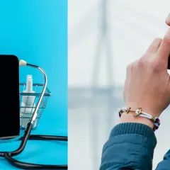 Telefon w koszyku z lekami i stetoskopem. Obok mężczyzna rozmawia przez telefon, nosząc bransoletkę z kotwicą.