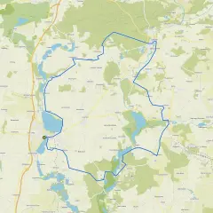 Mapa z zaznaczonymi trasami rowerowymi Kujawsko-Pomorskie. Widoczne jeziora, lasy i miejscowości.