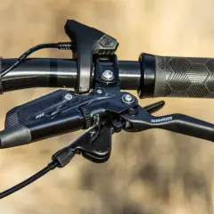 Close-up of a SRAM brake lever with RSC branding, ready for the next trail ride.