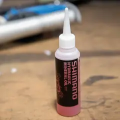 A bottle of Shimano hydraulic mineral oil, questioning if all mineral oil is the same.