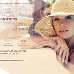 Mujer con sombrero de paja disfruta del sol, invitando a coleccionar emociones con MeliáRewards.