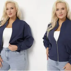 Kobieta plus size w granatowej kurtce bomberce, idealnej na co dzień.
