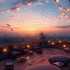 Ambiance féerique sur un toit-terrasse parisien, idéal pour profiter des meilleurs rooftop bars de Paris au coucher du soleil.