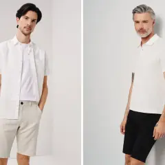 Dwóch mężczyzn w letnich stylizacjach. Jeden w beżowych spodenkach i białej koszuli, drugi w czarnych spodenkach i białej koszulce polo.