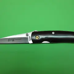 Navaja Herbertz con mango oscuro y hoja de acero pulido, lista para cualquier tarea.