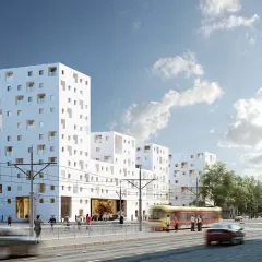 Nowoczesne budynki mieszkalne od lex deweloper z charakterystycznymi oknami i tęczą w jednym z nich. Tramwaj i samochody na ulicy.