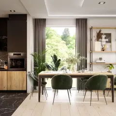 Nowoczesne planowanie kuchni z jadalnią. Drewniane fronty szafek, czarny blat i marmurowa ściana nadają elegancji. Zielone krzesła przy stole tworzą przytulną atmosferę.