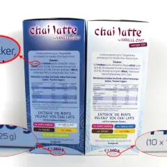 Zwei Packungen Chai Latte Vanille-Zimt. Die Zutatenliste zeigt "Zucker" als einen der Hauptbestandteile.