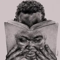 Portret mężczyzny czytającego książkę, symbolizujący głębokie zanurzenie w lekturze, klucz do zrozumienia przyczyn sukcesu wydawnictw butikowych i niszowych imprintów.