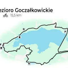 Mapa Jeziora Goczałkowickiego z zaznaczonymi trasami rowerowymi o długości 15,5 km. Widoczne punkty: parking, restauracje, drzewo, zamek, kawiarnia i lody.