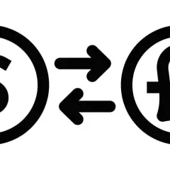 Symbol dolara i funta połączone strzałkami, ilustrujące wymianę walut, czyli co to są dewizy.