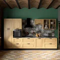 Cucina moderna con mobili in legno chiaro, parete verde smeraldo e soffitto a volta in mattoni. Ottime idee pittura cucina per un look rustico e contemporaneo.