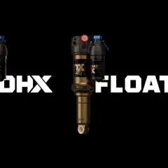 Two Fox bike suspension shocks, a coil DHX and an air FLOAT X, are displayed against a black background.