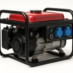 Groupe électrogène rouge et noir, prêt à fournir de l'énergie. Quelle puissance pour un groupe électrogène ? Ce modèle compact offre une solution fiable.