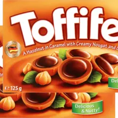 Toffifee: orzech laskowy w karmelu z kremowym nugatem i czekoladą.