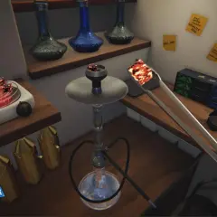 En shisha med glödande kol redo att användas. En Aladdin-inspirerad shisha-upplevelse i simulatorn.