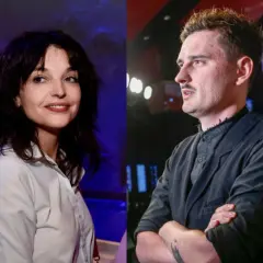 Dawid Podsiadło i jego partnerka, uśmiechnięta kobieta w białej koszuli, obok niego mężczyzna w czarnej marynarce.