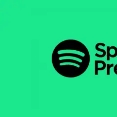 Logo Spotify Premium na zielonym tle. Czy Spotify jest za darmo? Sprawdź opcje!