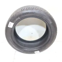Opona 205/50 R16 87V, idealna do Renault Clio II 1.2, z oznaczeniem "OUTSIDE" i kodem kreskowym.