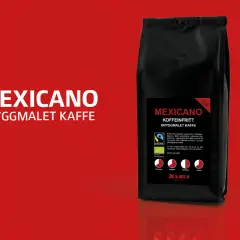 Svart påse med "MEXICANO KOFFEINFRITT BRYGGMALET KAFFE". Texten "KOFFEIN-FRITT" syns tydligt. Frågan om hur mycket koffein i koffeinfritt kaffe besvaras av att detta kaffe är koffeinfritt.
