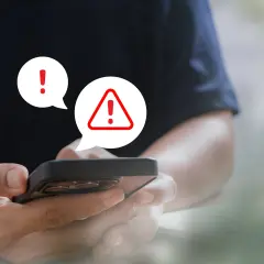Ostrzeżenie na telefonie! Uważaj na oszustwa typu vishing, które mogą próbować wyłudzić Twoje dane.