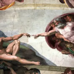 Michelangelo's "The Creation of Adam" fresco, showing God's finger reaching to Adam's.