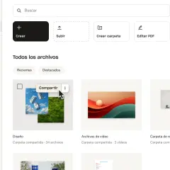 Carpeta de diseño con dados y césped, mostrando que son los archivos compartidos. Al lado, carpetas de videos y referencias.
