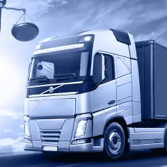 Ciężarówka i Temida symbolizują kontrolę, ład i sprawiedliwość w firmie transportowej.