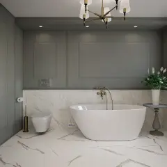 Elegancka łazienka z wolnostojącą wanną, marmurowymi płytkami i stylową sztukaterią w łazience.
