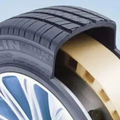 Przekrój opony Michelin z żółtym wzmocnieniem, zapewniającym jazdę typu runflat.