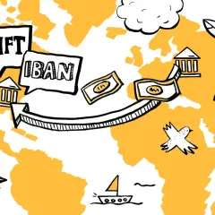 SWIFT i IBAN na mapie świata, symbolizujące międzynarodowe przelewy. Pieniądze płyną między bankami, a ptak i żaglówka sugerują globalną podróż.