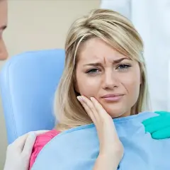 Ból zęba po zatruciu: Jak sobie radzić i kiedy do dentysty?