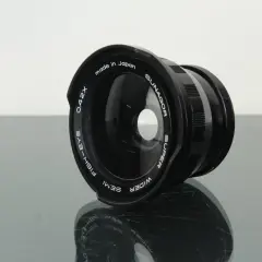 Czarny obiektyw rybie oko Sunagor 0.42x, wyprodukowany w Japonii, z napisem "Super Wider Semi Fish-Eye".