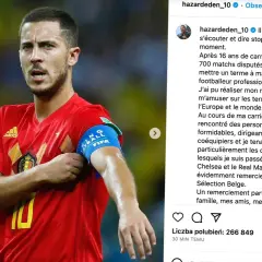 Eden Hazard w czerwonej koszulce reprezentacji Belgii z opaską kapitana.